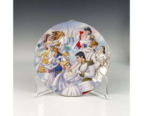 Three dimensional hanging plate featuring Disney prince and princess couple in storybook wedding theme. Disney backstamp. Dim