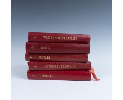 A set of 5 collector's Lifetime edition bound field guides in dark red genuine leather covers with red bookmark ribbons. Set 