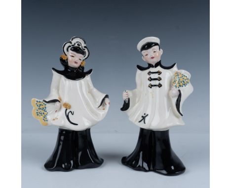 This adorable pair of Asian figurines is modeled in traditional white and black, and gold-gilded outfits decorated with highl