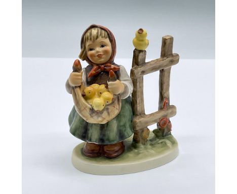 A sweet porcelain figure of a small girl holding a bundle of chicks. Marked Goebel 385. Issued: 1971Dimensions: 4"L x 3"W x 5