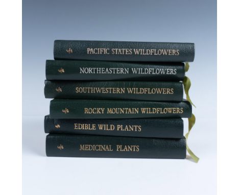 A set of 6 collector's Lifetime edition bound field guides in green genuine leather covers with green bookmark ribbons. Set i