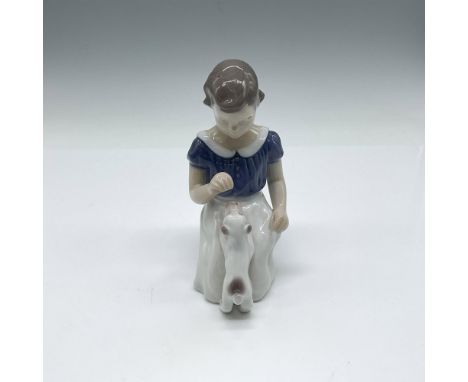 Kneeling figure training her pup. Colored in white, blue and brown. B&amp;G backstamp. 2316. Issued: 20th centuryDimensions: 