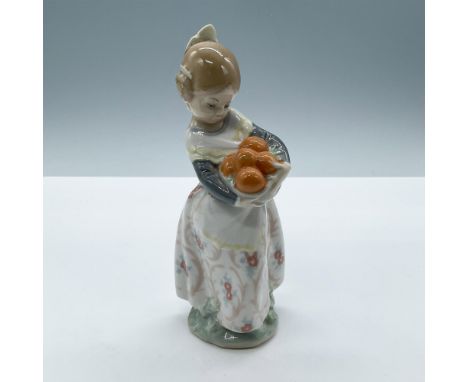 Depicts a young girl in a floral skirt dress, holding a basket of oranges. Lladro backstamp. Artist: Fulgencio GarciaIssued: 