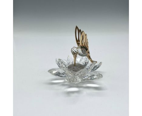 Part of the In-Flight Group this clear crystal bird is adorned with gilt rhodium wings, beak and legs. Further adorned with g