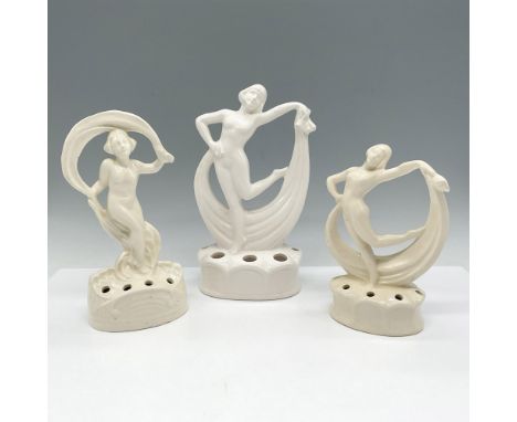 White porcelain nude figures with scarfs. Set includes 2 smaller frogs 6.25"H &amp; 7.25"H and larger figure 8.25"H. S.D.D. J