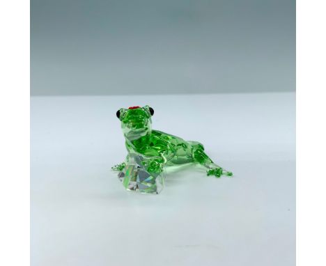 This limited edition Swarovski crystal Gecko is made from green crystal, with black eyes, and red stones on the top of his he