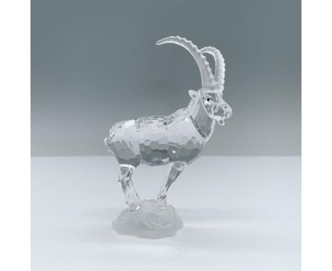 The body of this delicate ibex is made from clear faceted crystal, with black eyes and, and frosted crystal horns and base. I