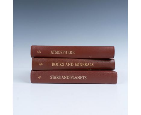 A set of 3 collector's Lifetime edition bound field guides in brown genuine leather covers with brown bookmark ribbons. Set i