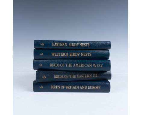 A set of 5 collector's Lifetime edition bound field guides in dark blue genuine leather covers with light blue bookmark ribbo