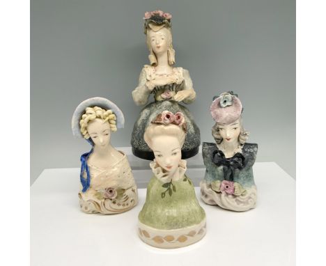 Hand painted porcelain group of diverse busts, featuring a large lady in a cream dress, a young lady with exposed shoulders, 