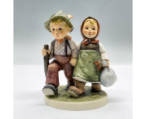 This porcelain figure features a boy and girl on a walk, holding hands. Marked Goebel Hummel 383. Issued: 1972Dimensions: 4"L