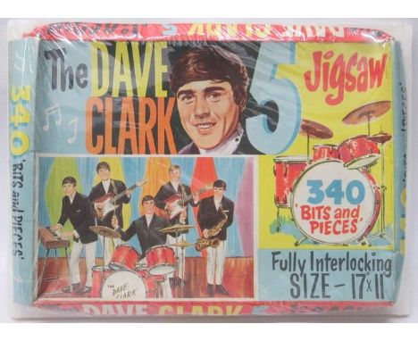 Dave Clark Five Jigsaw Box 1964 and Dave Clark Five Ceramic Jewels and badge 