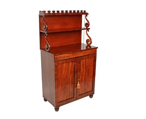 A small Regency mahogany chiffonier, c.1820, the raised back with two stepped shelves, the upper shelf with shaped gallery, b