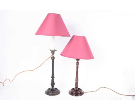 A Georgian mahogany candlestick converted to a table lamp with modern shade, overall heigh 65cms; and a 19th Century Georgian