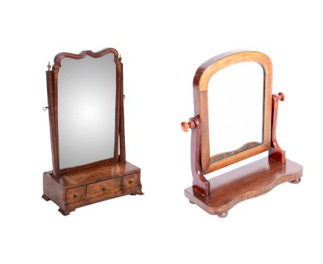 A mid-18th Century walnut and line inlaid swing framed toilet mirror, with the arched bevelled plate between fluted uprights,