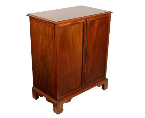 A Victorian mahogany two door estate/file cabinet, c.1860, the rectangular moulded top above a pair of panelled doors enclosi