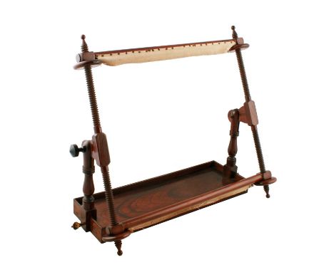 A Victorian turned rosewood 'Treen' needlework or tapestry frame, with adjustable stretcher bars to a piece of material up to
