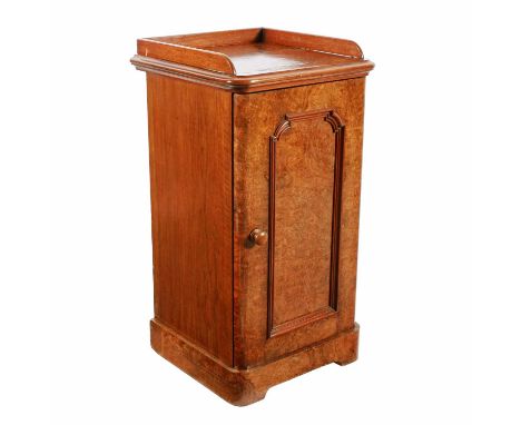 A Victorian burr walnut bedside cabinet by John Taylor &amp; Son of Edinburgh, c.1860, the gallery top with moulded edge and 