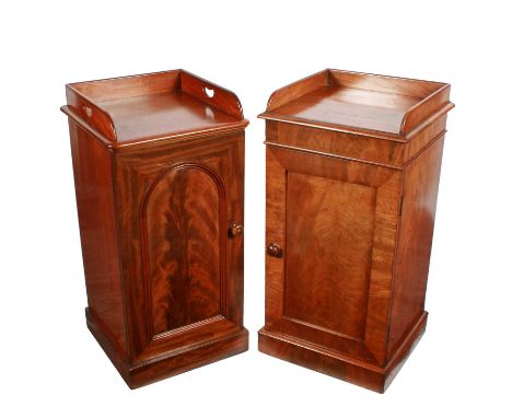 Two similar mid 19th-Century mahogany bedside cabinets, c.1850, with left and right-hand opening doors, one with an arched pa
