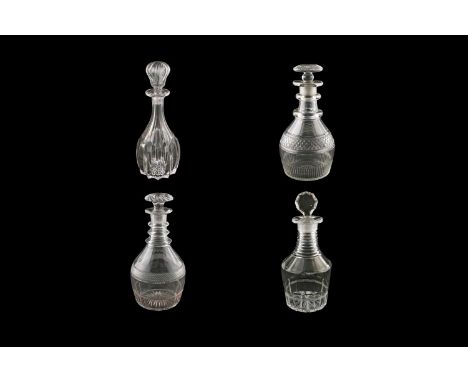 Four 19th Century cut glass decanters, comprising: a George III cut-glass triple ring-necked decanter and stopper, c.1810, th