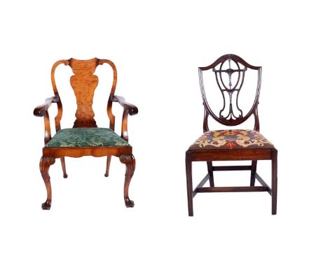 A George I style walnut and burr walnut elbow chair, with broad vase-shaped splat, out splayed arms, drop in seat and scroll 