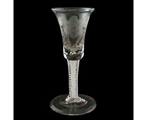 A George II opaque spiral stem wine glass, c.1750, of Jacobite interest, the trumpet-shaped bowl engraved with a rose, leaves