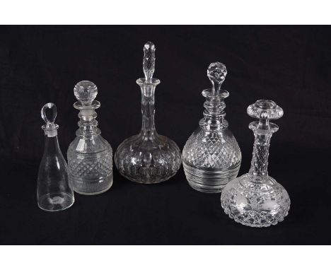 Five assorted Georgian and later mallet/globe and shaft cut-glass decanters, various sizes.PROVENANCE: The Graham Smith Retir