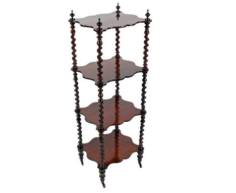 A Victorian rosewood four-tier whatnot, c.1860, the four serpentine shelves on spiral supports, the top shelf has four turned