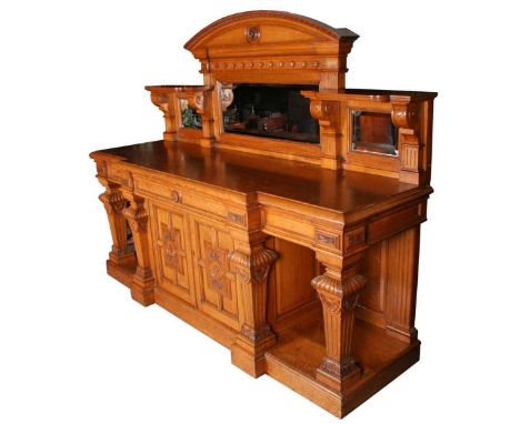 A large and impressive Victorian honey coloured oak breakfront mirror-backed sideboard, by Alexander Cree &amp; Co, Glasgow, 