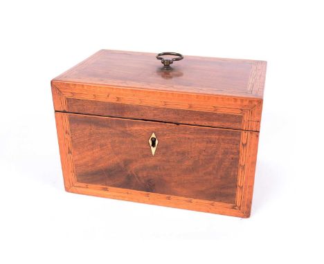 A Georgian mahogany and feather banded tea caddy rectangular with fitted interior, 21 x 13cms.