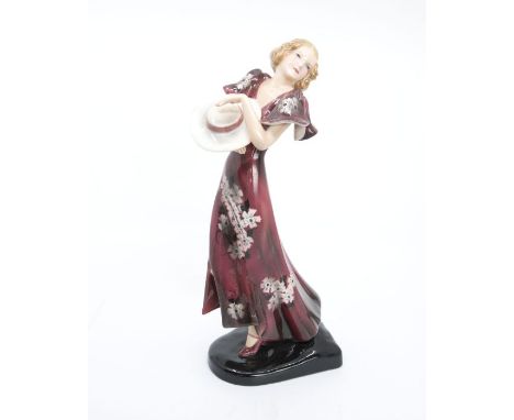 A Goldscheider signed Dakon figure of a young woman