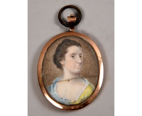 An early 19c portrait miniature on ivory of Susan Metcalf, oval pendant framed and glazed - glass a/f, 1.75in x 1.5in.