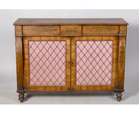 A Regency rosewood side cabinet of rectangular form with brass rail inlay, crossbanded with reel carved edged moulding, the s