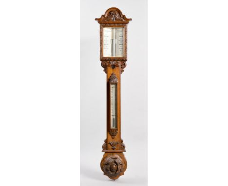A late 19c cistern barometer signed W. Aronsberg &amp; Co, 12 Victoria St. Manchester on its twin bone register plates which 