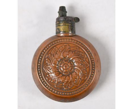 A Victorian pistol powder flask of circular embossed form, 3.5in diam.