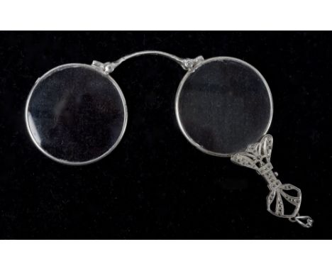 A pair of white metal and marquesite lorgnette.