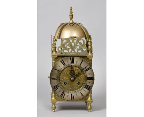 A late 19c lantern clock probably assembled by Richard et Cie in France using a German movement.  The movement ting tang stri