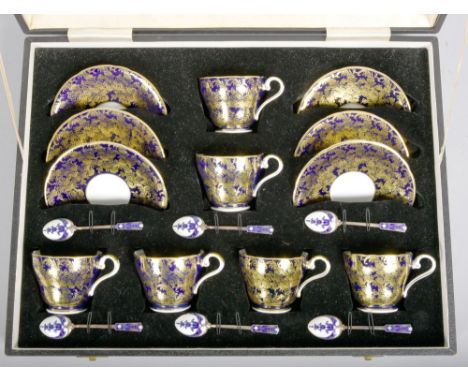 A cased set of mid 20c Aynsley colbalt, blue and gilt decorated coffee cups and saucers, pattern no.869, together with six si