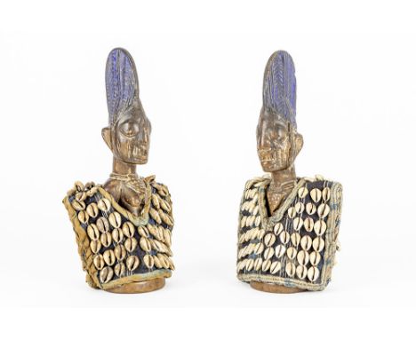 pair of Nigerian Yoruba "Ibedji" (twin)sculptures in wood with patina of use and age and with original vest with shellsAFRIKA