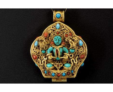 Tibeto-Nepalese ghau in yellow gold on silver with turquoise and coral and with the depictions of Chenrezi (outside) and the 