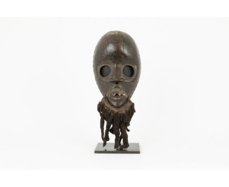 late 19th/early 20th Cent. Ivory Coast fire mask from the 'Dan' in wood with original beard made of human hair and original r