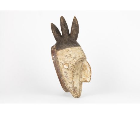 African Mali Dogon mask in wood with caolinAFRIKA  -  MALI  -  ca 1950 "Dogon" masker in hout met witte kaolin - met gebruiks