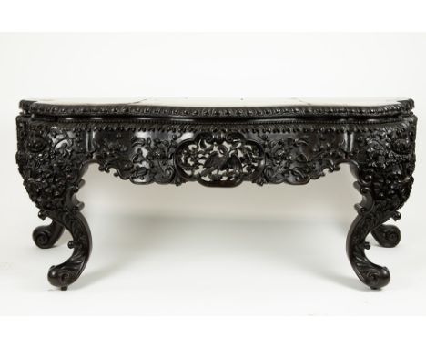 imposing antique Chinese richly sculpted hardwood console, presumably in ironwood, with a marble top with nicely detailed flo