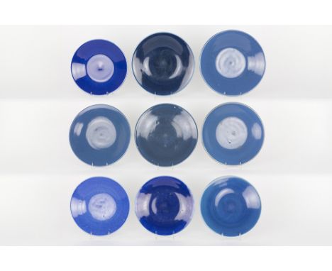 series of nine Chinese KangXi period plates in porcelain with cobalt-blue glaze  with a letter of Christies' dd 1983Reeks van