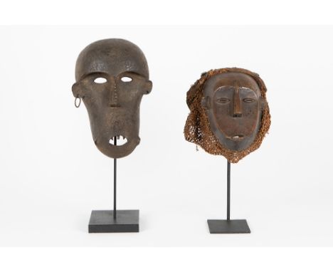 two African masks in wood to be dated around 1950 : one monkey mask from the Ngbaka (Congo) &amp; one from the Chokwe Lunda w