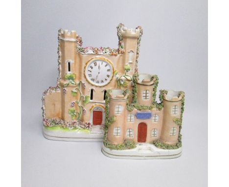 Two Staffordshire Castles one with a clock, the other Norwich castleCirca: 1850Size: 24cm H & 15cm HCondition of Norwich: Cen