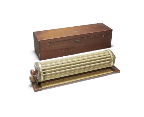 A Thatcher's Calculator by Keuffel &amp; Esser,  Model 4012,with inner rotating cylinder and outer scales, on mahogany base, 