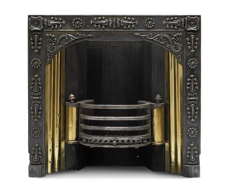 A Regency Steel, Cast Iron and Brass Register GrateThe basket enclosed by ripple moulded brass panels, the frame embellished 