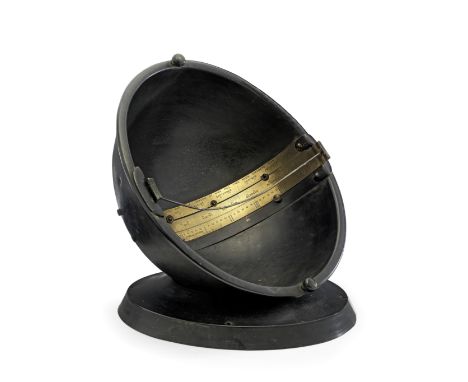 A Homan's Solar Chronometer, English, circa 1915,the black painted metal hemisphere with one fixed and one sliding brass scal