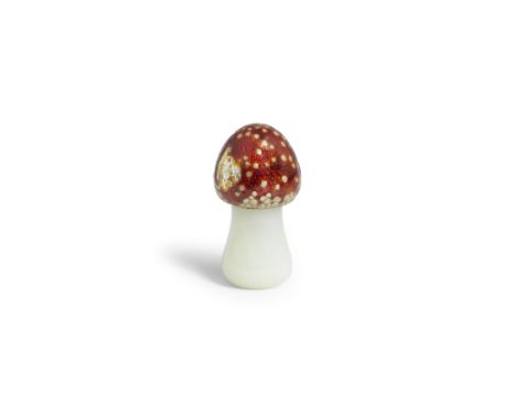 An unusual Art-Nouveau enamelled gold and bowenite toadstoolthe bowenite stem surmounted by red guilloché enamel cap applied 